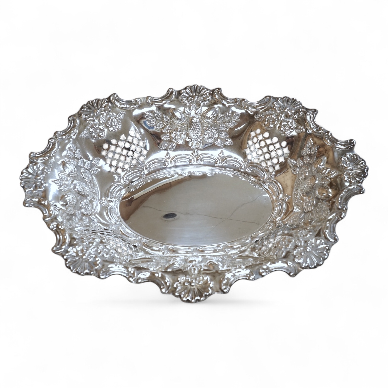 A late Victorian pierced silver oval dish, with shell and scroll border, by Ellis & Co, Birmingham, 1897, length 30.4cm, 10.5oz.